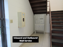 Building mailboxes with inbound and outbound mail service by the stairwell
